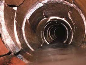 This is an image of a broken drain in need of repair from ASL Limited