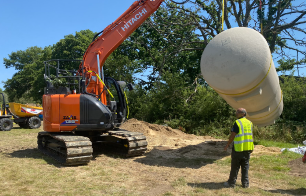 An image of a domestic sewage treatment plant being installed.