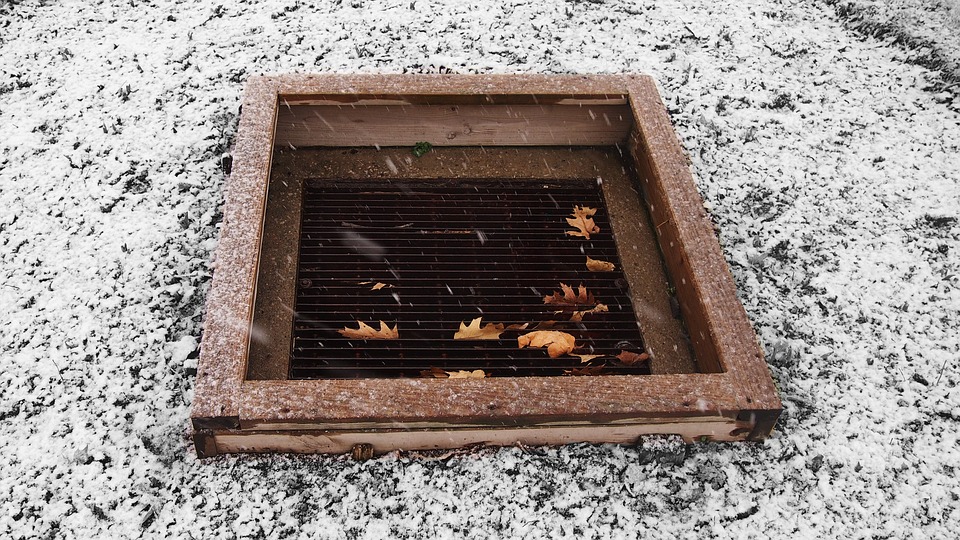 Rainwater drain blocked with mud