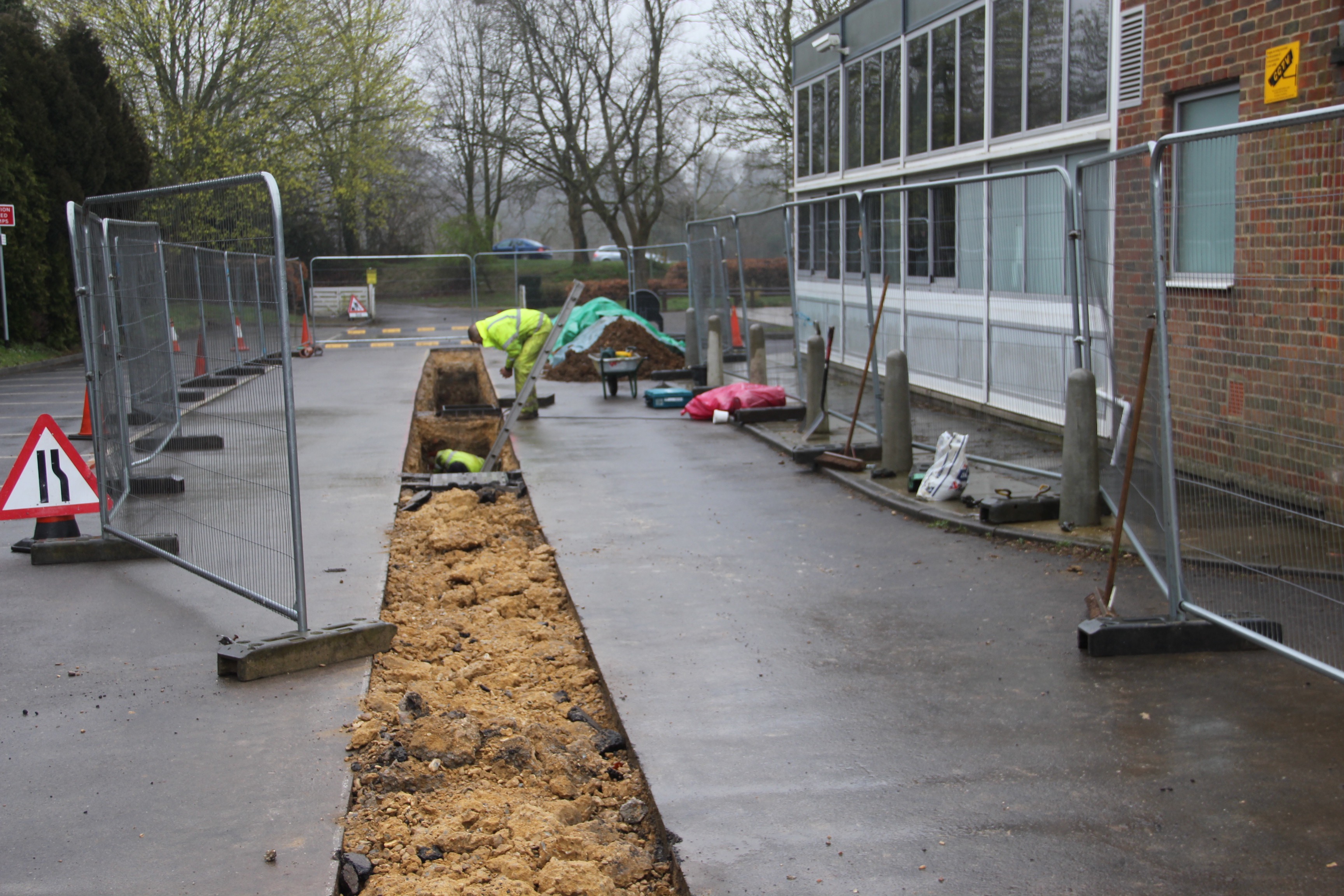 This image shows the trench in the concrete backfilled.