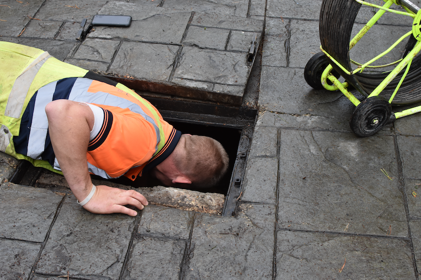 Our Liam shoulder deep unblocking a drain.