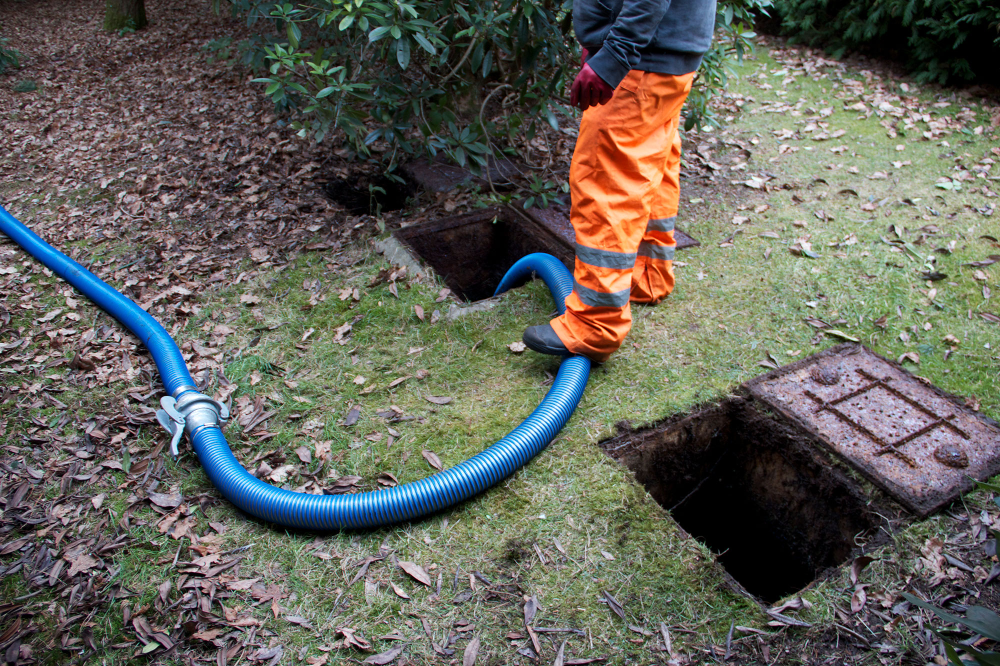 A septic tank being emptied and desludged.