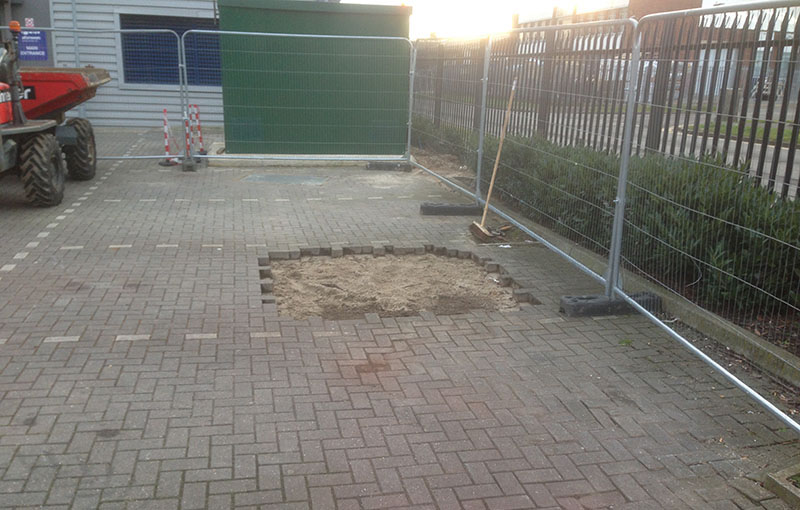 This image shows the trench in the concrete backfilled