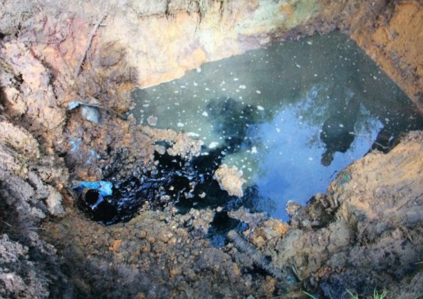 This picture shows grease, fat and oil that has been pushed through the system due to surface water getting into the wastewater system.