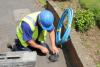 A photo of an ASL Limited water mains expert in action.