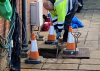 This picture shows our Darren attending to a blocked drain with rodding equipment.