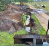 A drainage field that has stopped working and turned black.