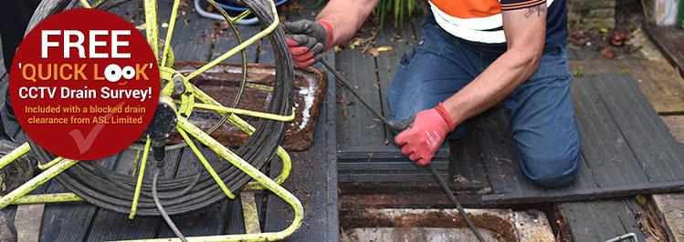 An image of an ASL Safecontractor Approved blocked drain operative unblocking drainage