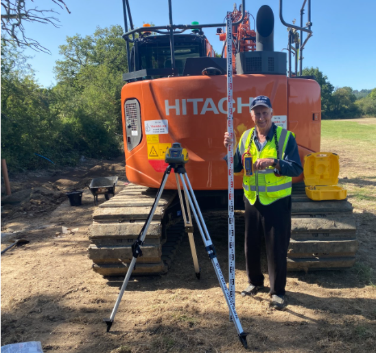 Our Gerry carrying out a site level survey.