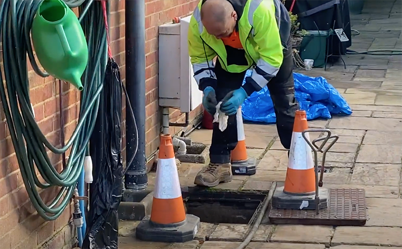 Our Darren clearing a blocked drain in Guildford, Surrey
