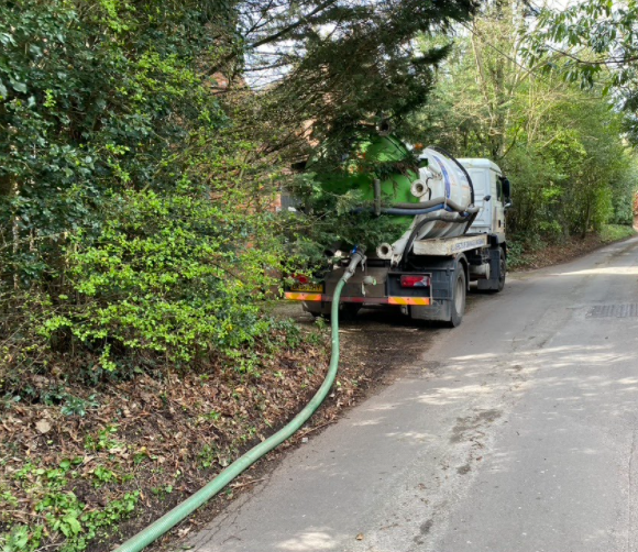 Gully sucking maintenance to keep surface water draining.