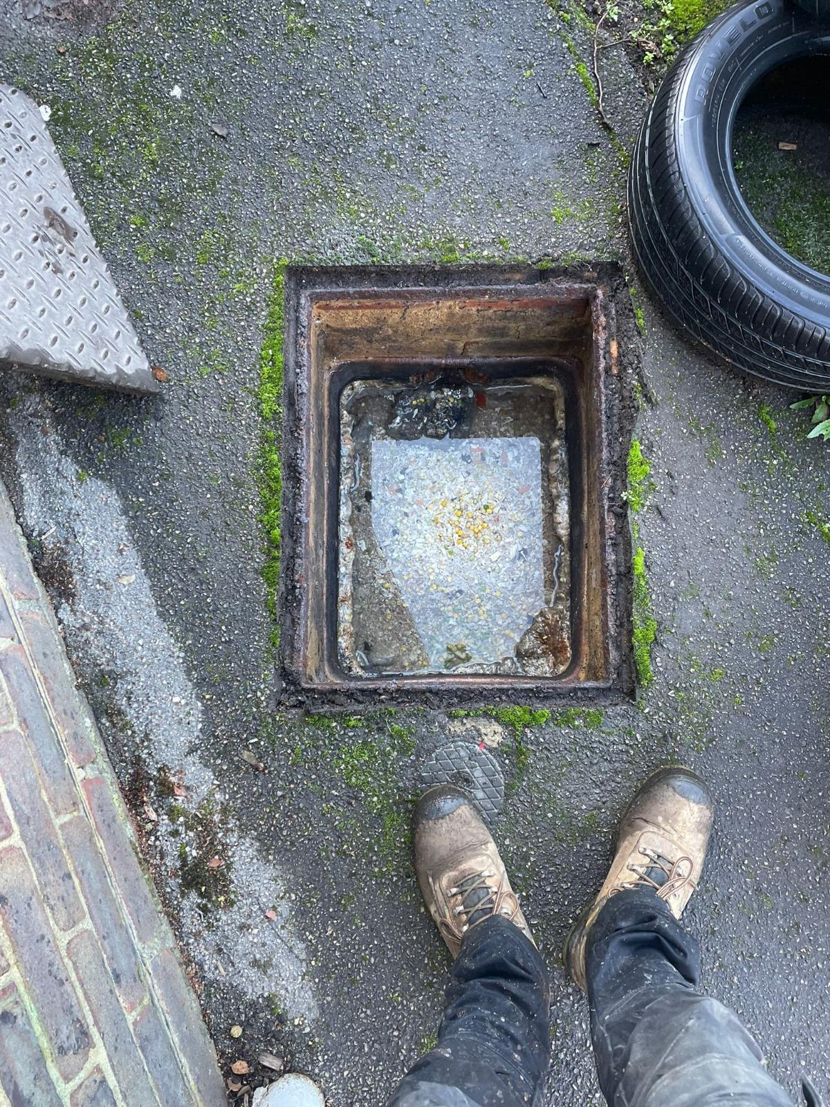 A blocked drain in Guildford, Surrey