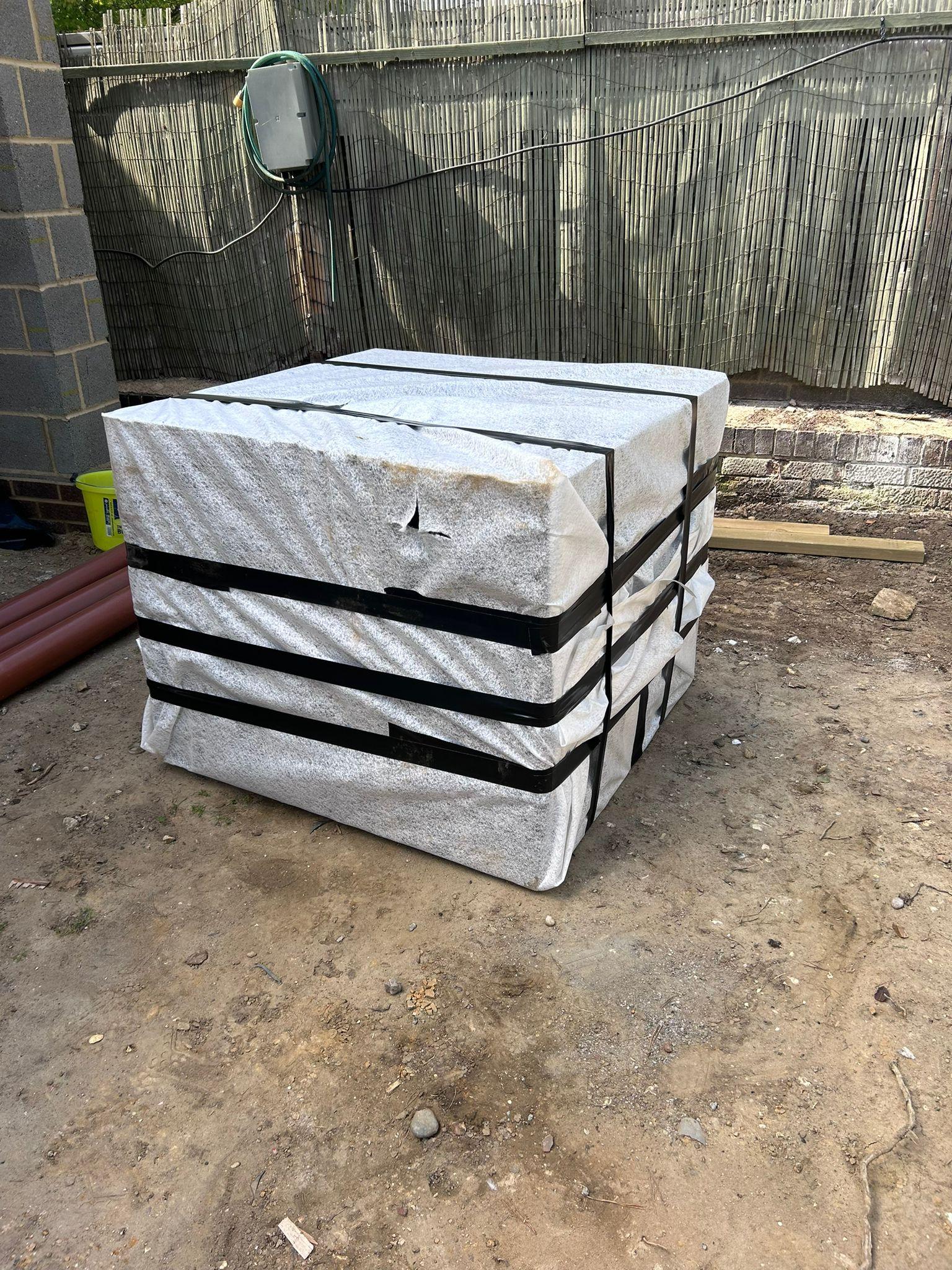 Crates prepped with membrane ready to go into the soakaway.
