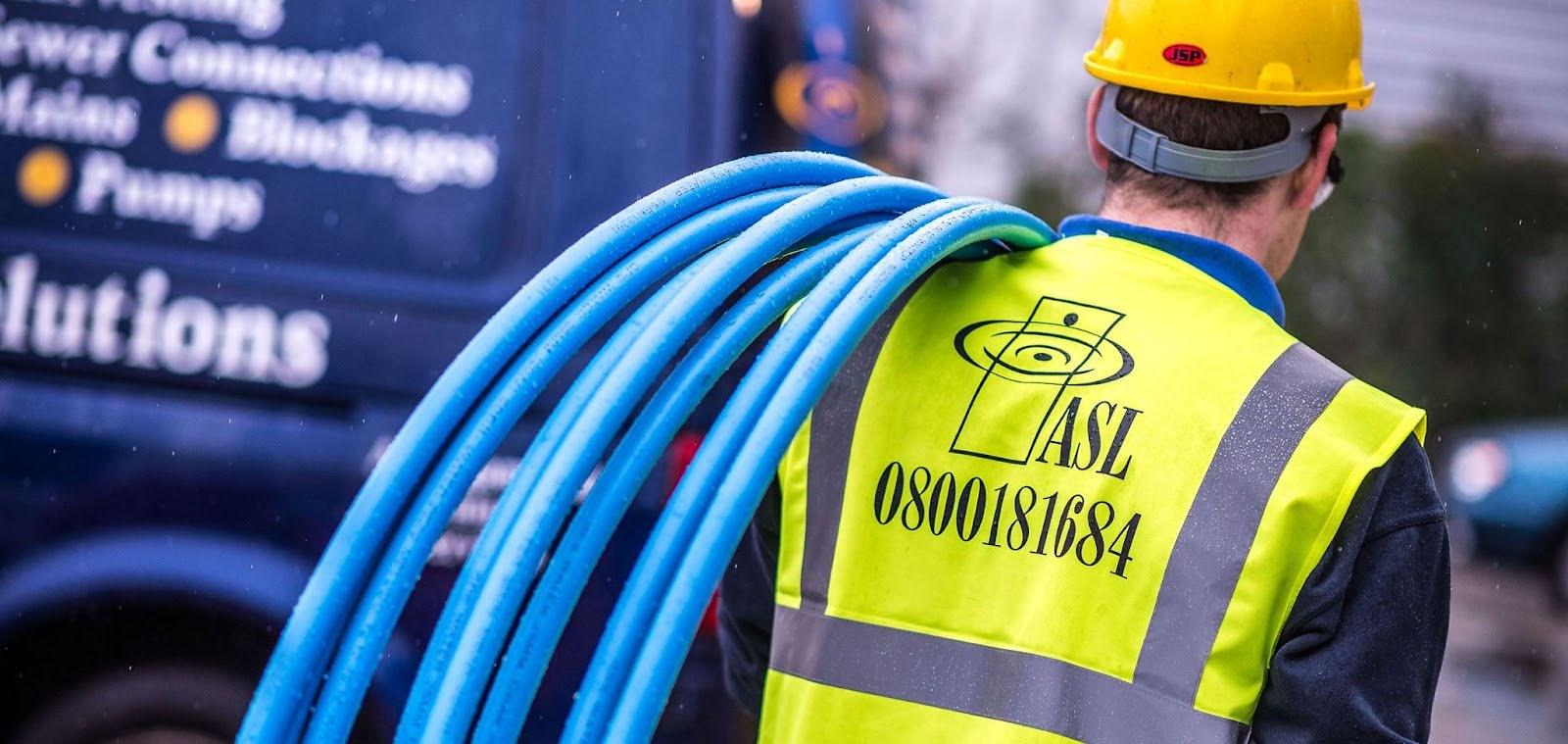 asl engineer fixing watermain