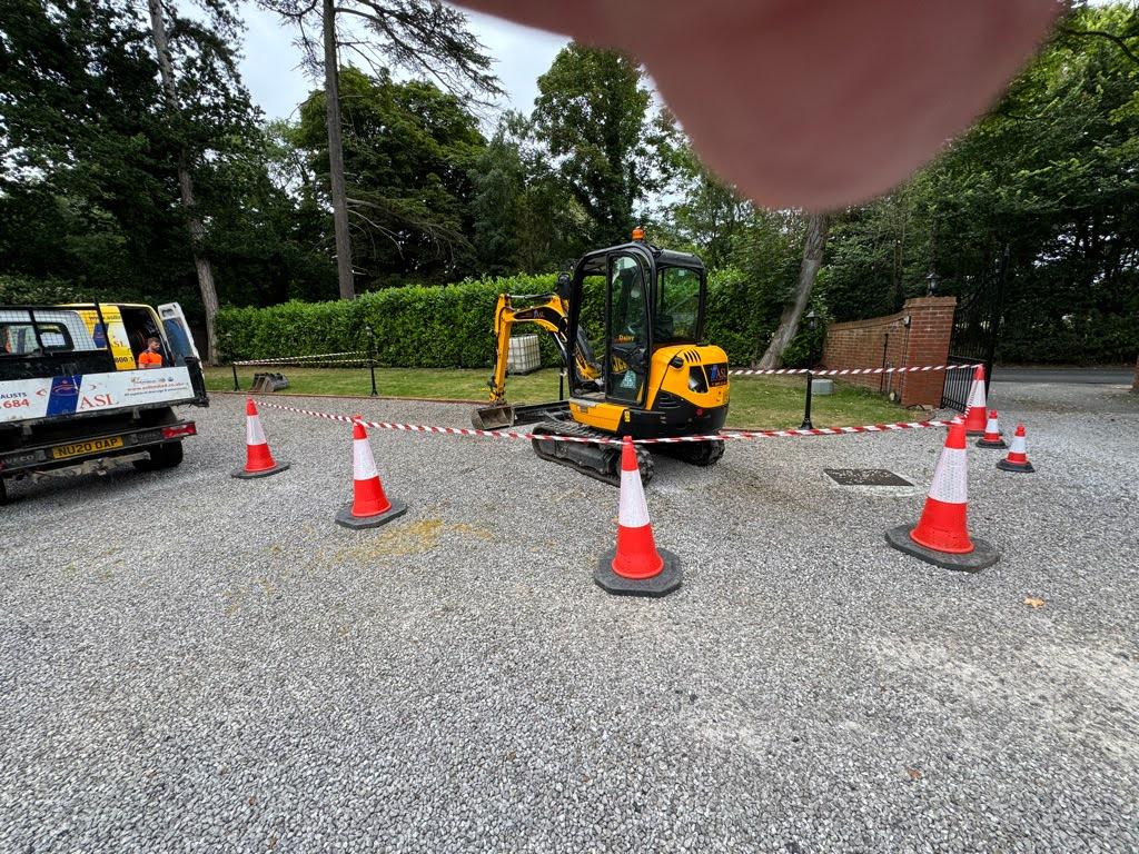 digger in cordoned area