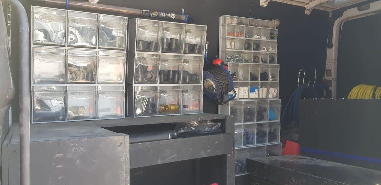 looking at teh inside of an ASL work van with all equipment ready to go