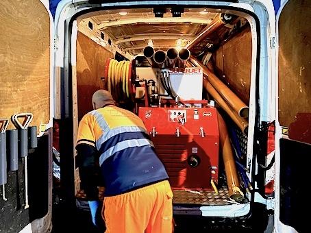 The view of the jetter machine inside the ASL Limited drainage van.