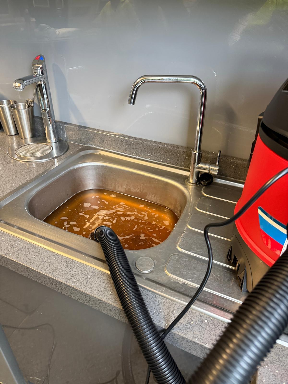 Using the wet pick up easily unblocks the drain