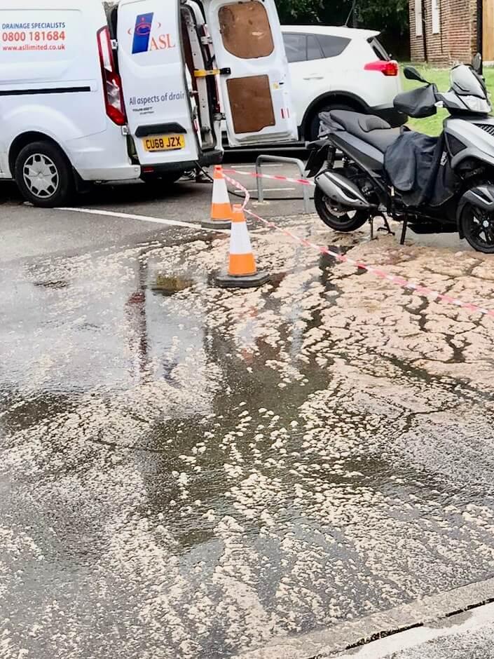 An image of the disruption caused by a blocked inspection chamber in Haslemere.