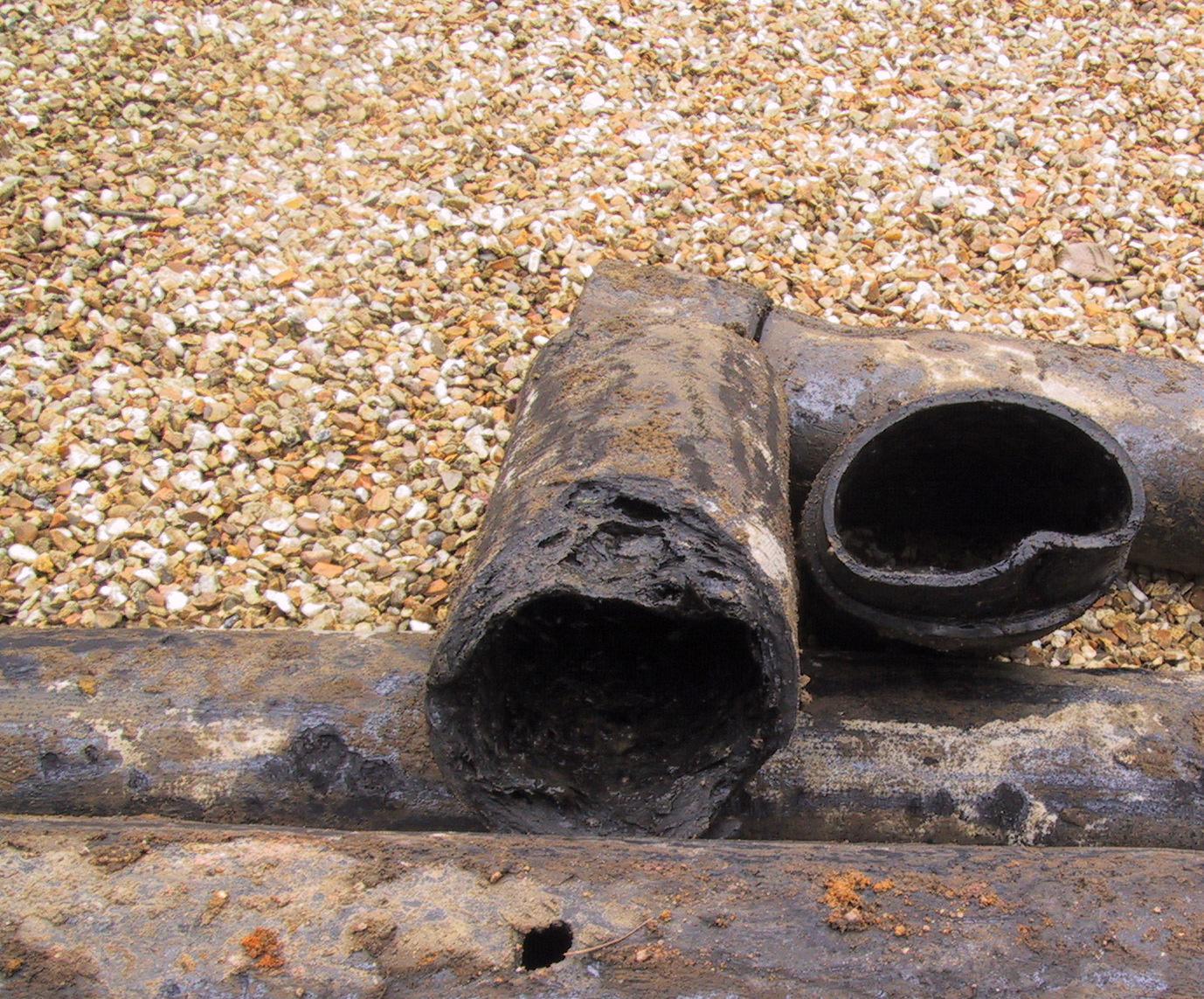 This is an image of old pitch-fibre pipes during a drain repair in Cranleigh.