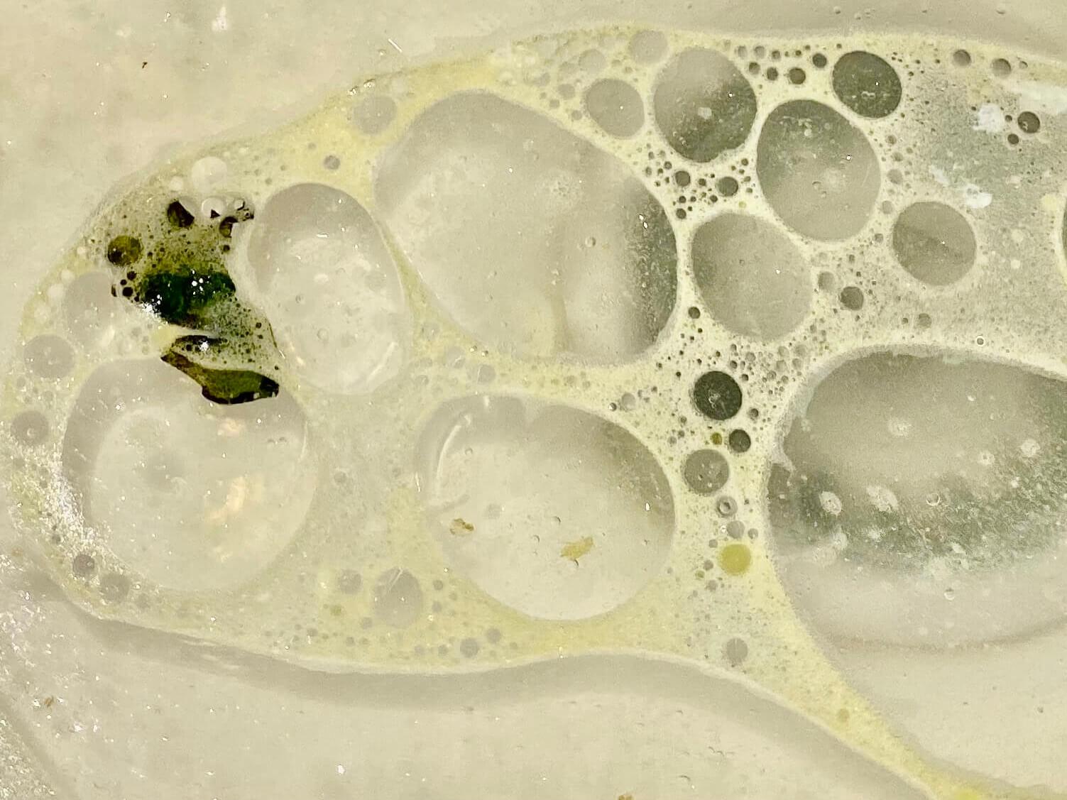 An example of fatty bubbles in washing up water that will end up in the drains.